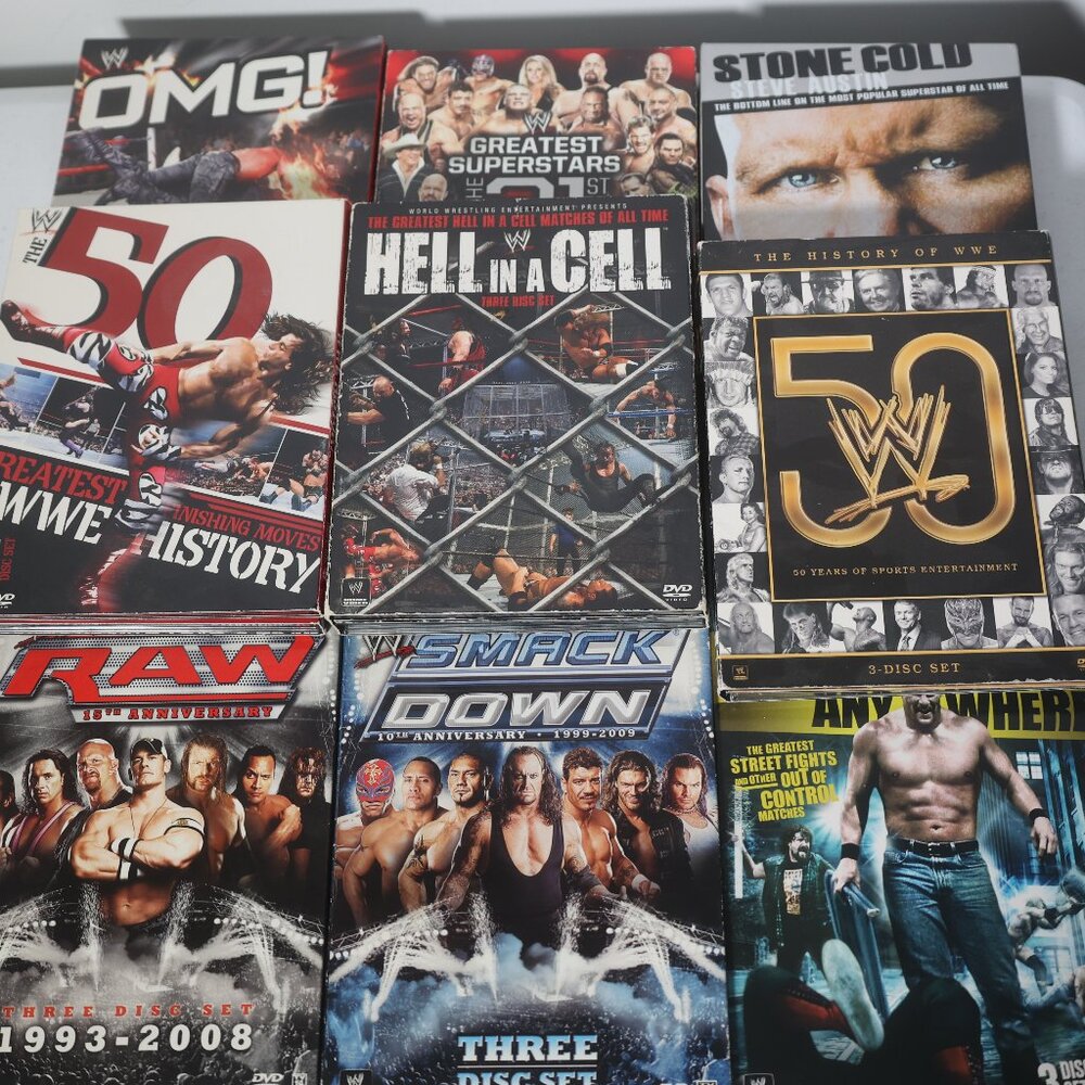 Lot of 9 WWE DVDs Raw, SmackDown, Stone Cold, OMG, History of WWE, Greatest Supe
